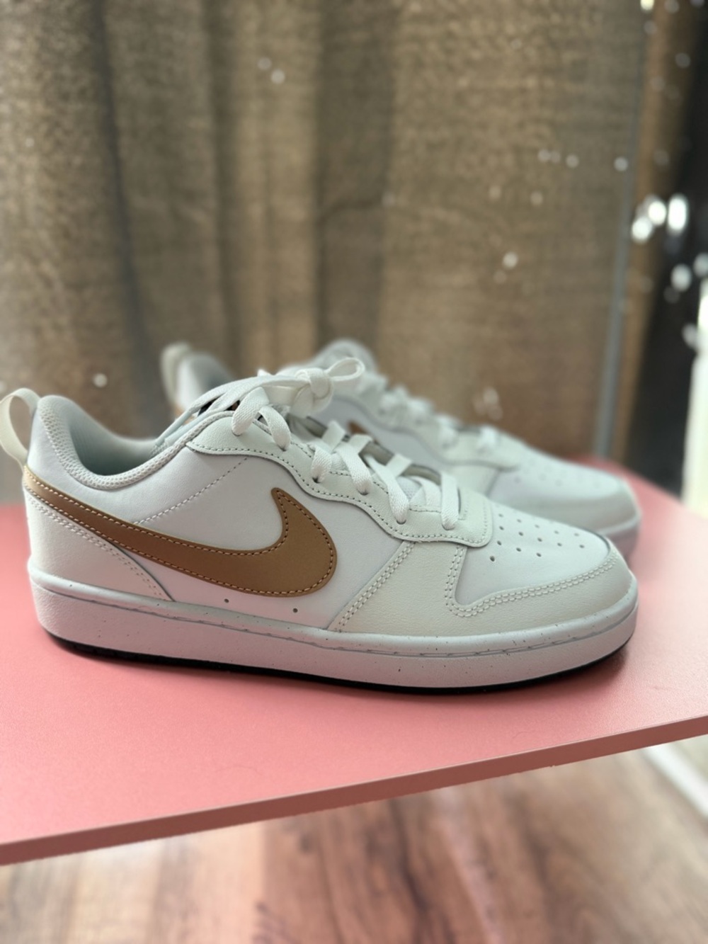 Nike White Low-Top Sneakers with Tan Swoosh